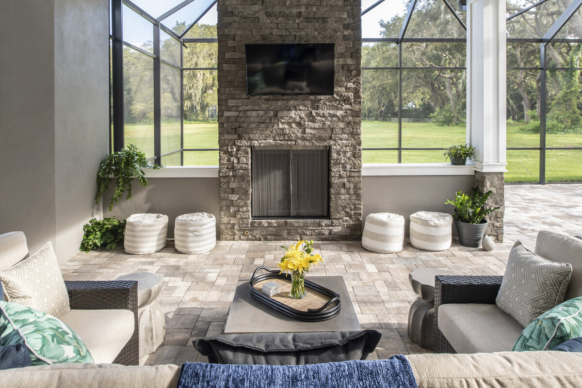 Rockwall Outdoor Fireplace with Comfy Beige Sofa Sets