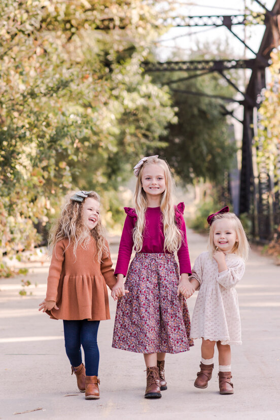 three-girls-walkig-on-sweetwater-river-bridge-san-diego