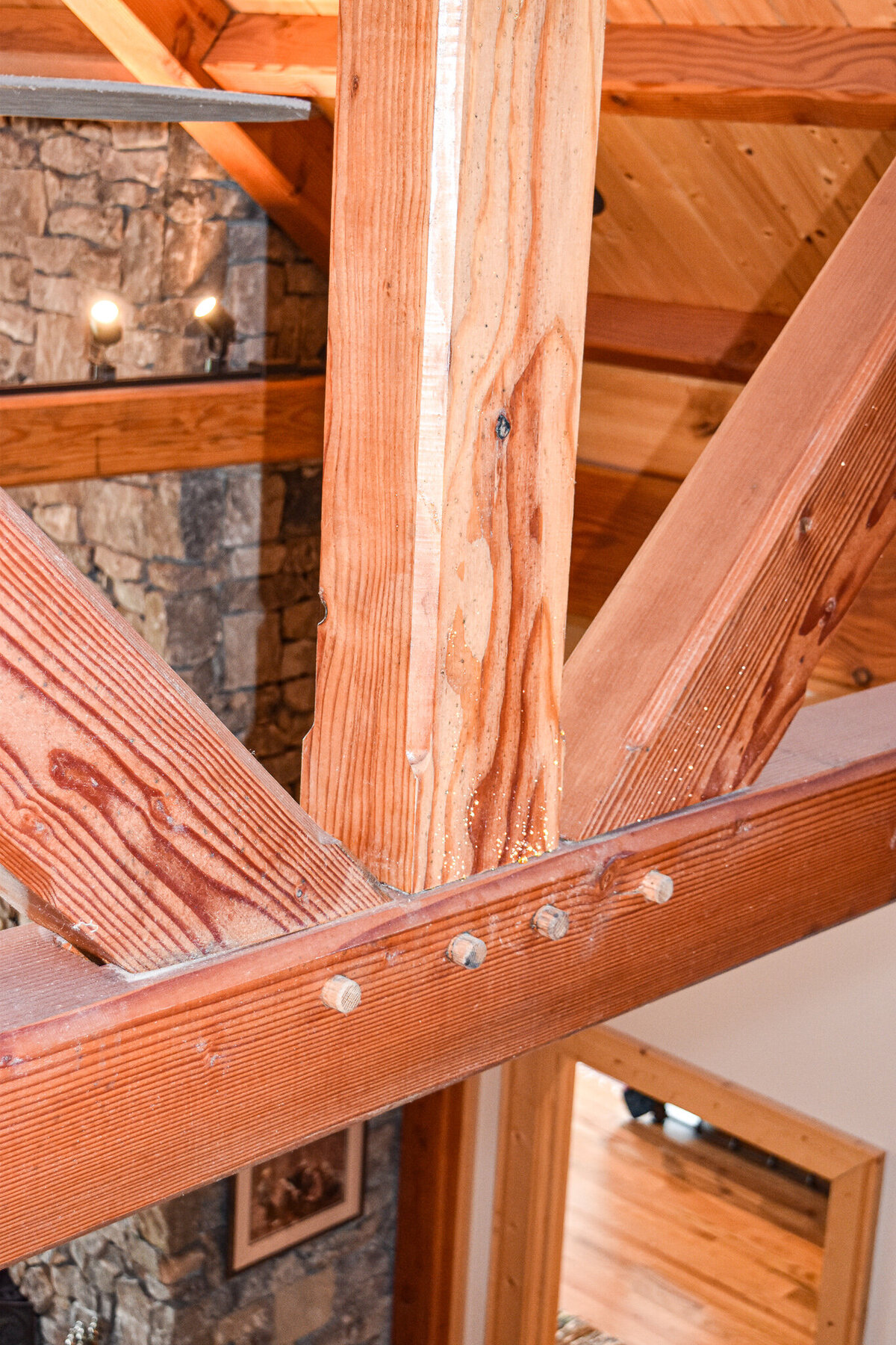 Explore stunning timberframe custom homes built by Ryan Noble Construction. Featuring exposed wooden beams, vaulted ceilings, and rustic charm, each home is a perfect blend of craftsmanship and natural beauty. Discover how timberframe construction adds warmth and elegance to your dream home