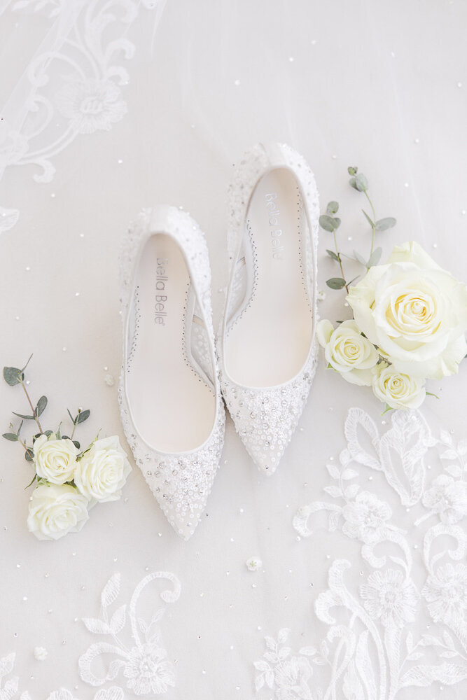 flat lay of bridal outfit details