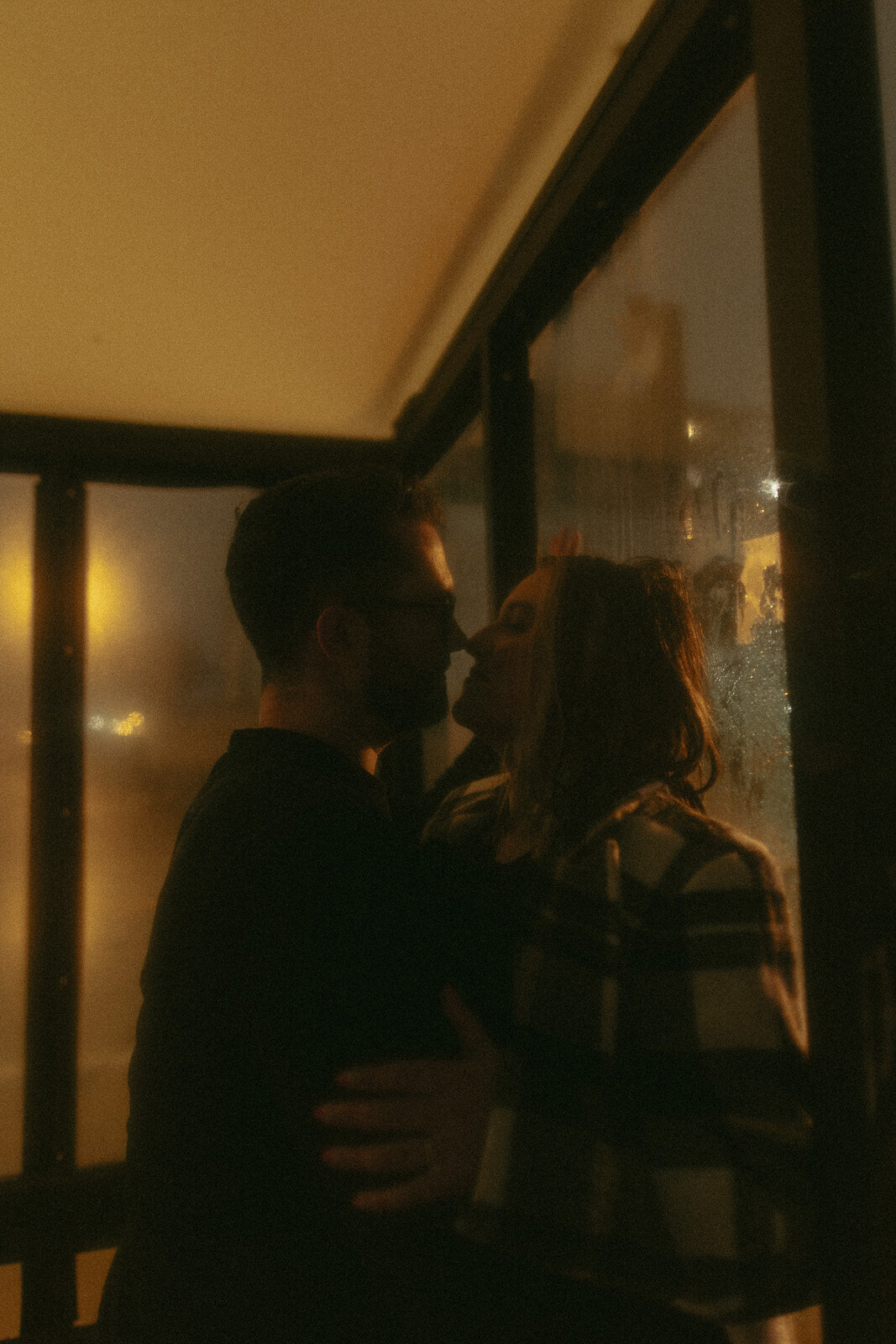 couples-rain-playful-night-session-downtown-moody-umbrella-film-illinois-52