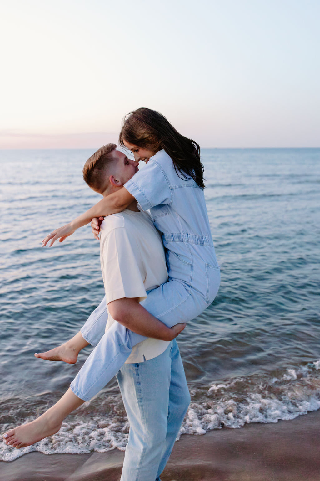 An engagement photography session at The Wrigley Building and North Ave Beach in Chicago, Illinois - 38