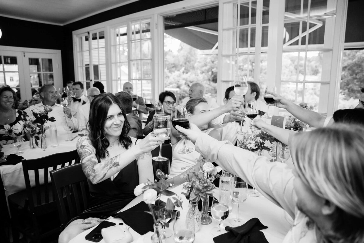 Guests cheersing drinks after speeches