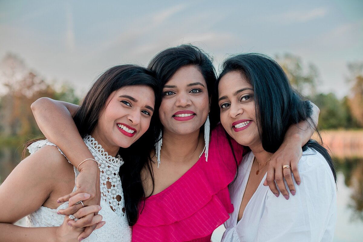 Girls trip for a big birthday, in matching outfits, hugging their best friends