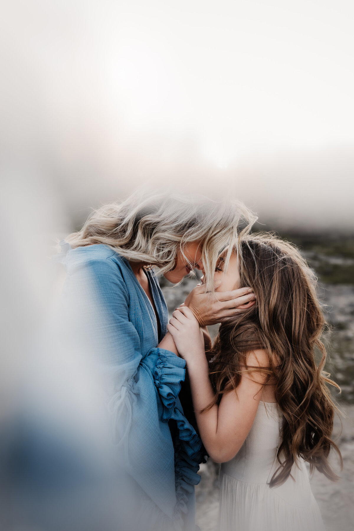 mother daughter facing eachother 