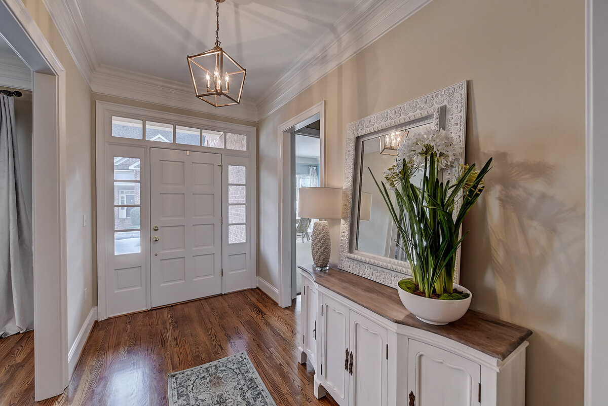 Entryway with white sideboard