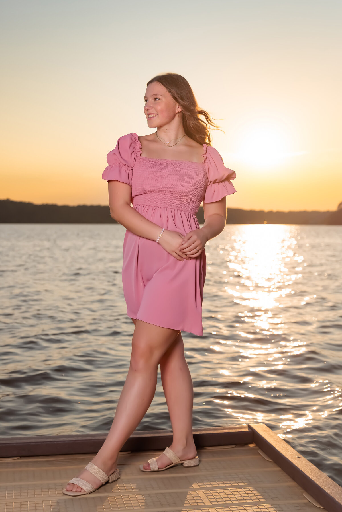 Raleigh Lake at sunset near the water for these teen portraits.
