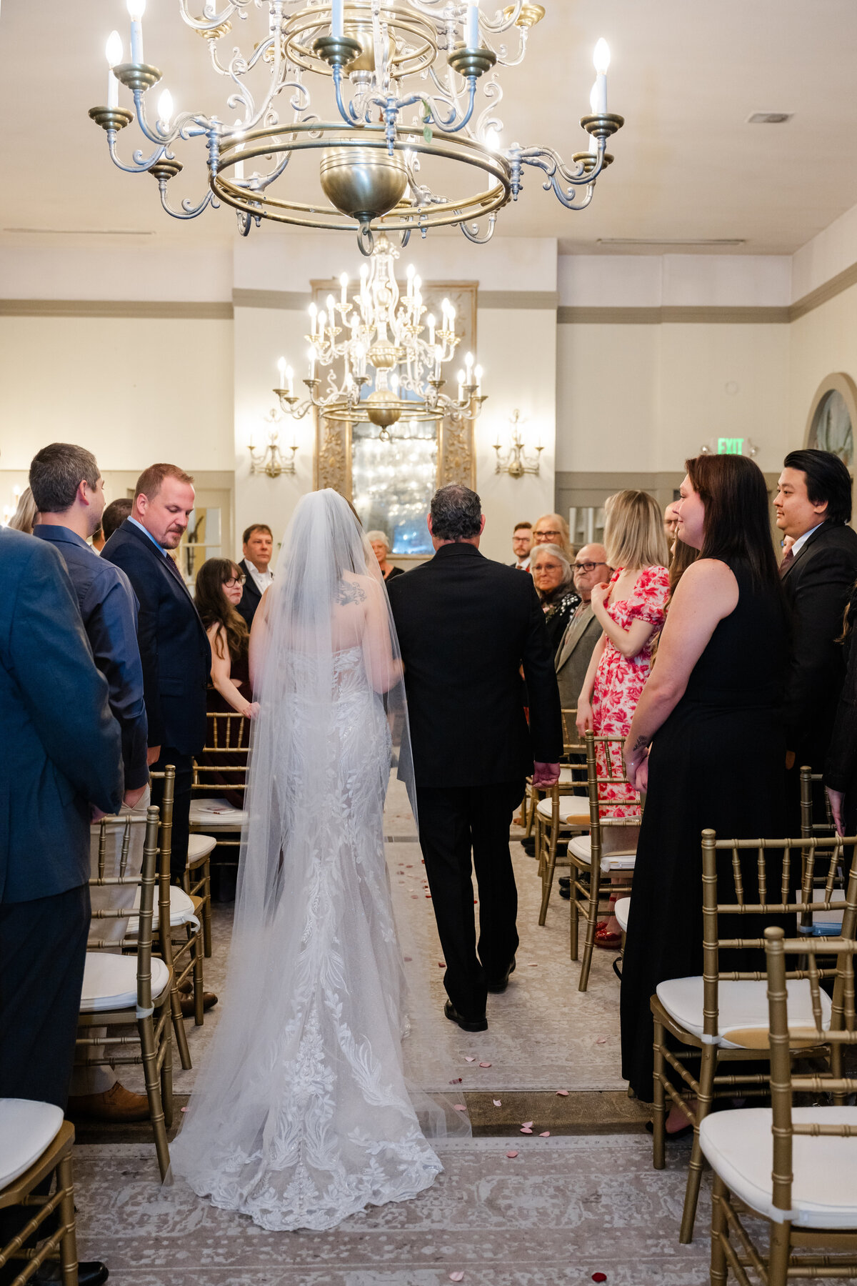 father and bride walk down aisle ballroom wedding at the ruins seattle washington