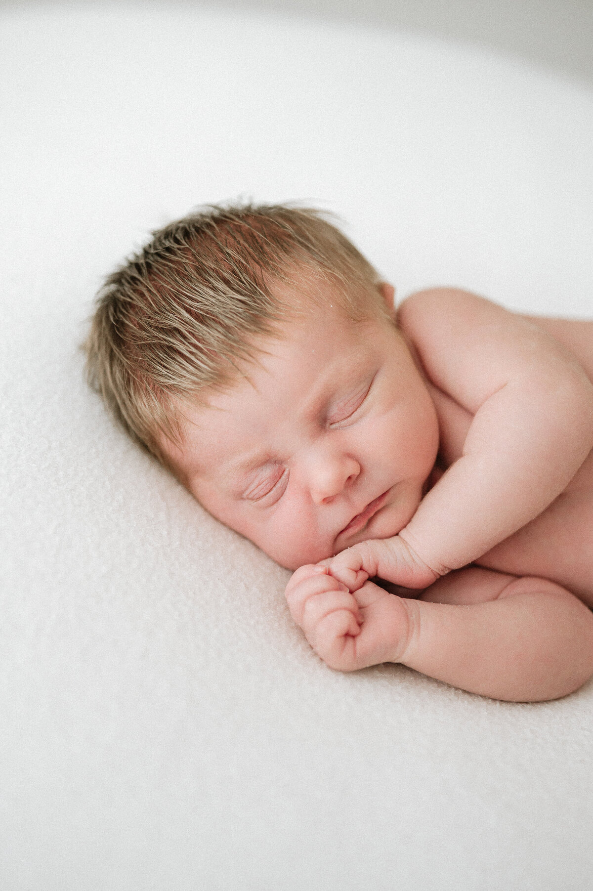 Stylish photography of a sleeping newborn baby