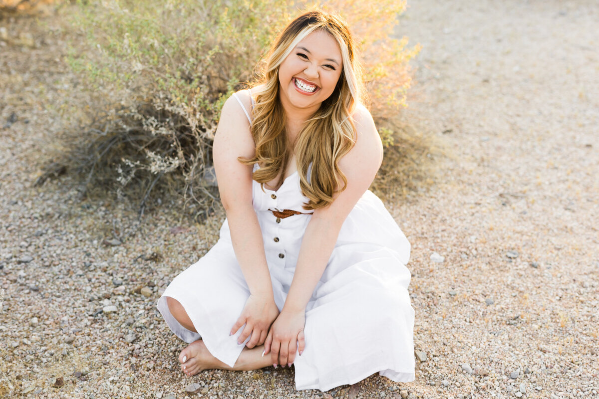 high school senior girl posing for Scottsdale senior photography session in the desert