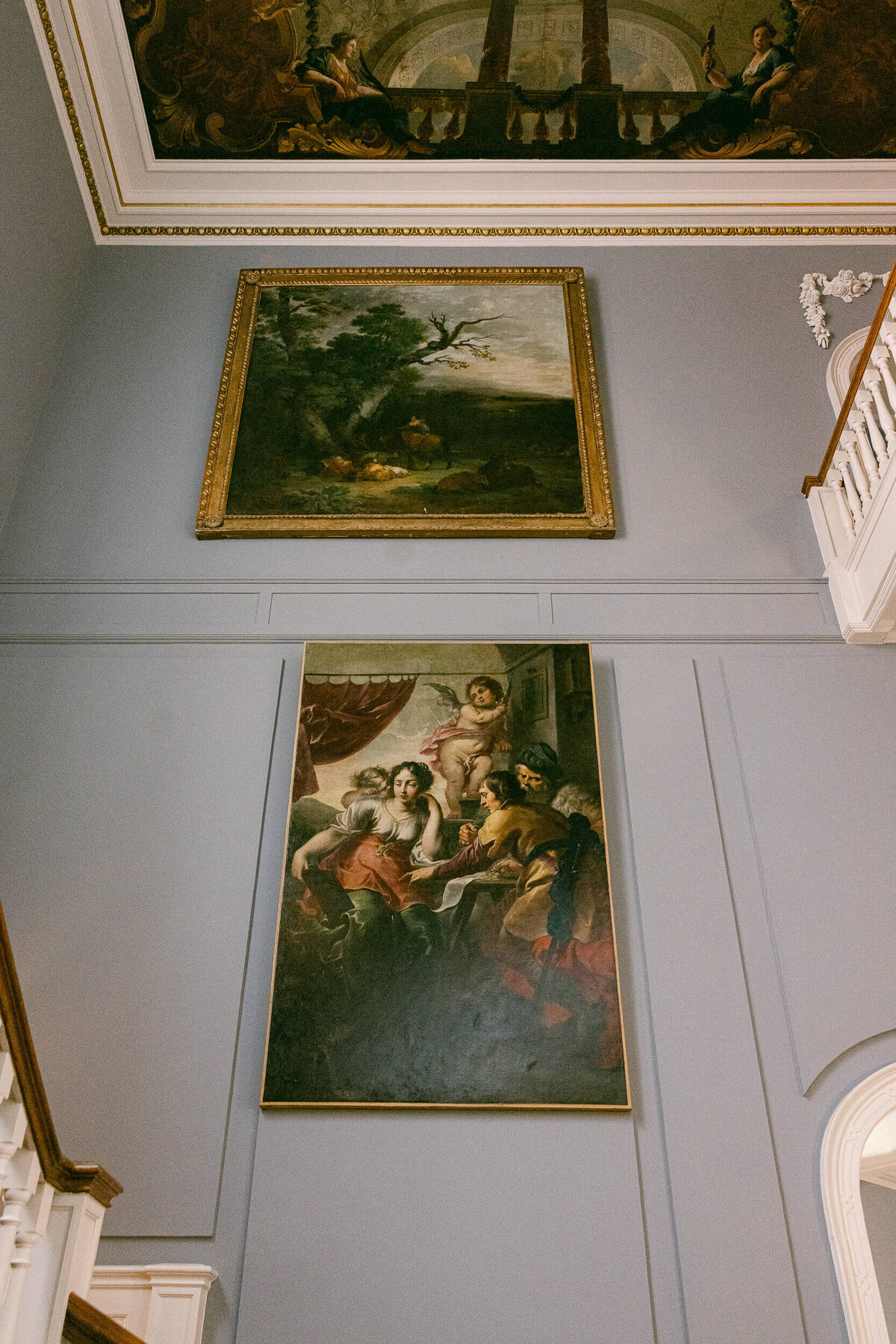 A wedding photo showing off the wall art at Luttrellstown Castle