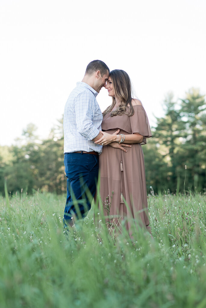 Couple kissing in field at sunset | Sharon Leger Photography | CT Newborn & Family Photographer | Canton, Connecticut