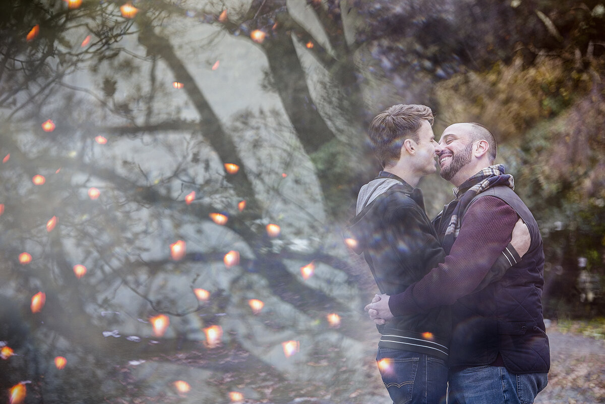 A couple kissing in the park