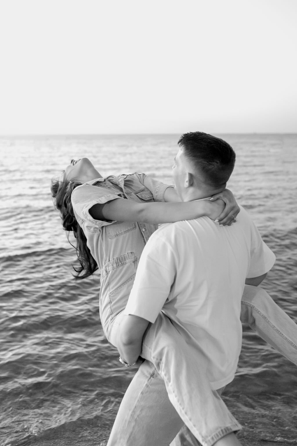 An engagement photography session at The Wrigley Building and North Ave Beach in Chicago, Illinois - 39