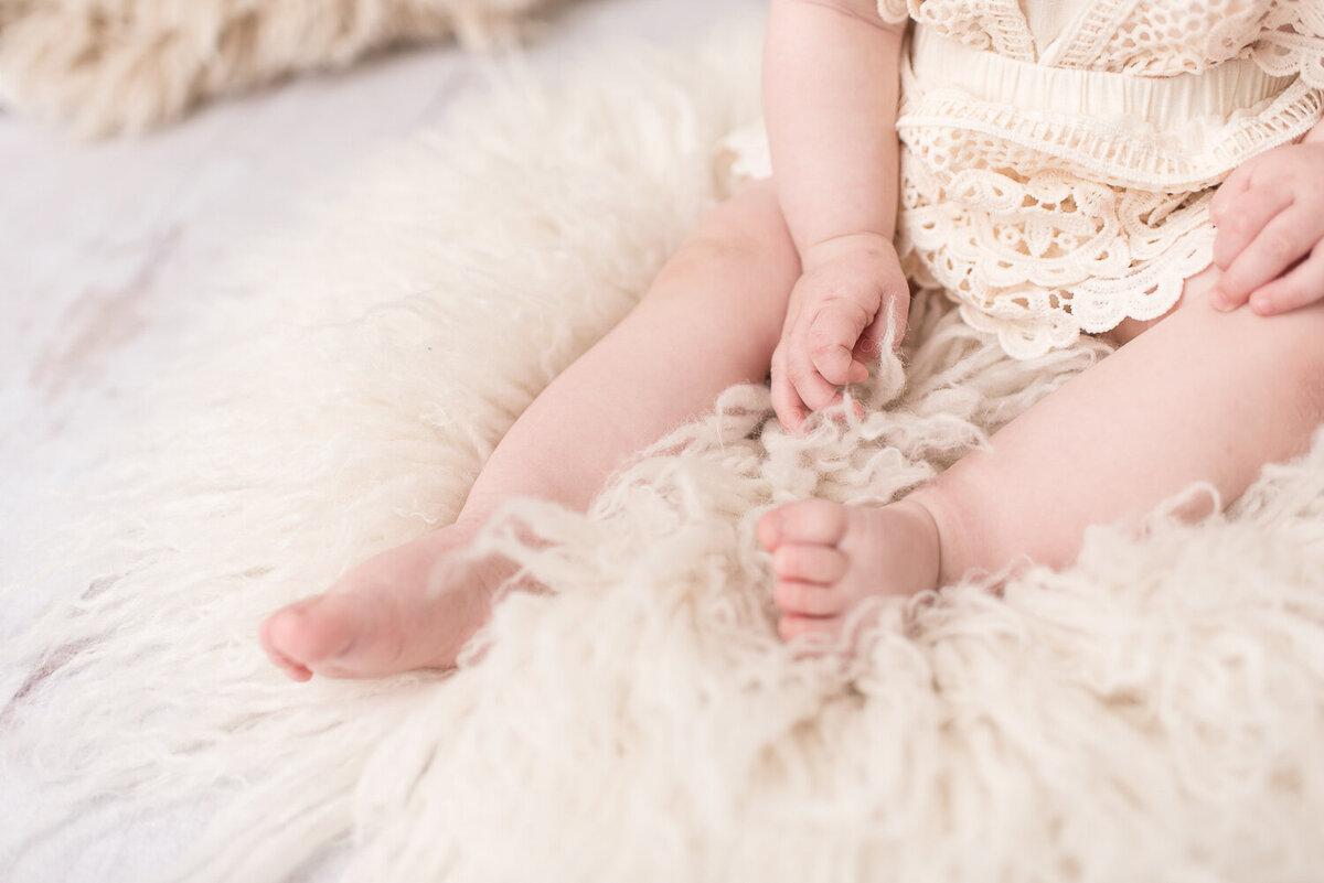 Detail shot of baby girl toes at rustic cake smash session |Sharon Leger Photography || Canton, CT || Family & Newborn Photographer
