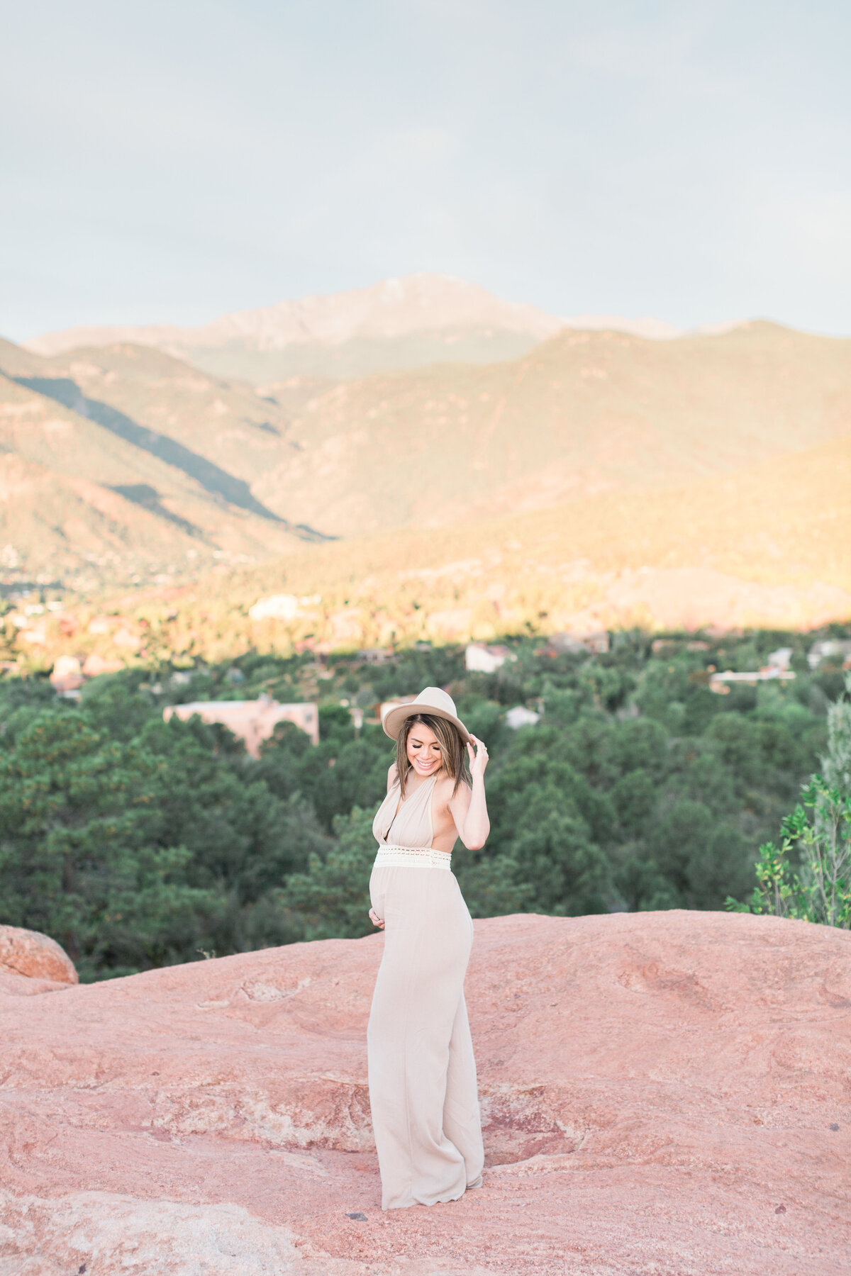 Pregnant mom during maternity session at Garden of the Gods