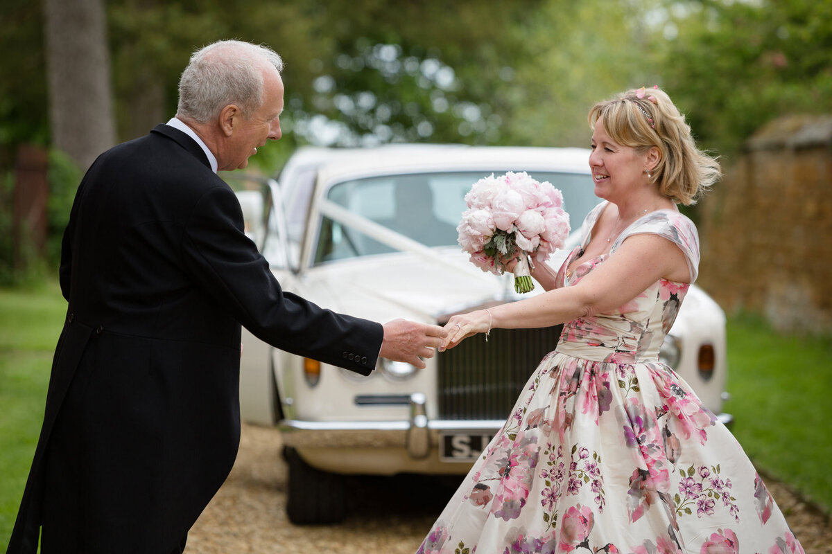 Bride wearing a floral wedding dress
