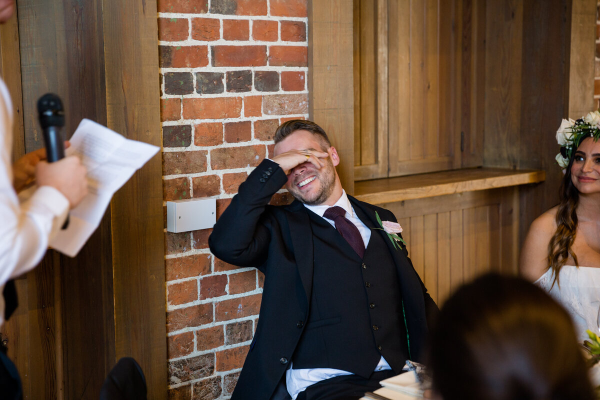 Groom shows emotion during speech