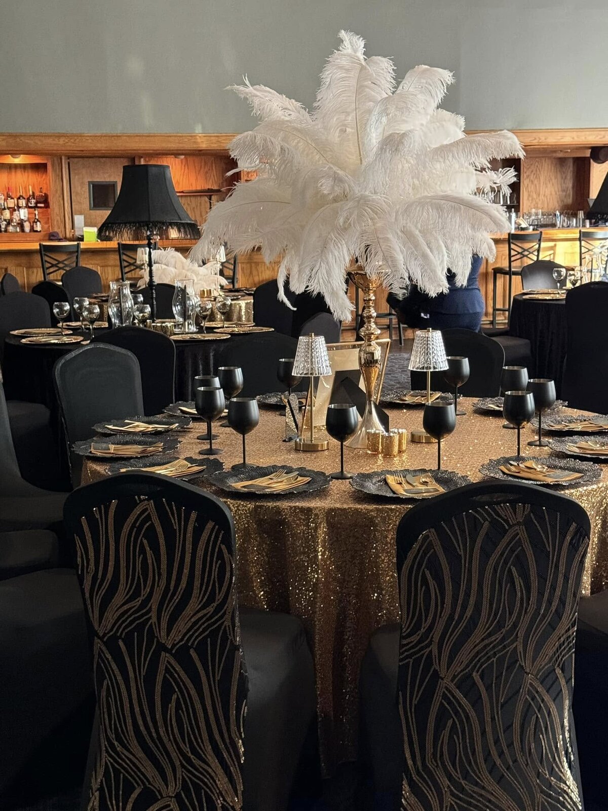 harlem-nights-retirement-party-table-white-feathers-view