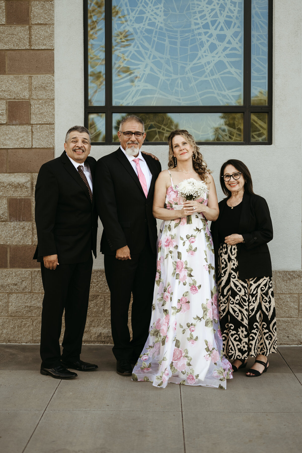 Bride & groom standing with their witnesses