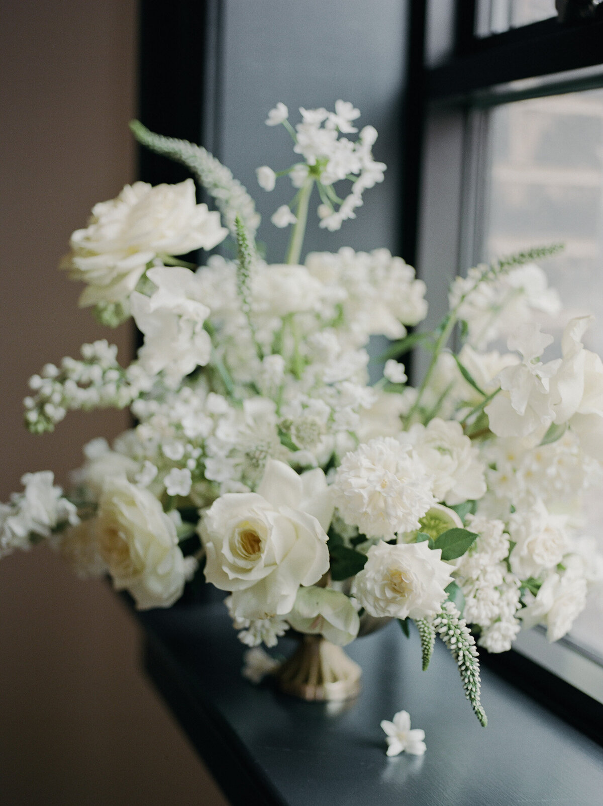 soft white wedding flowers at Shinola Hotel
