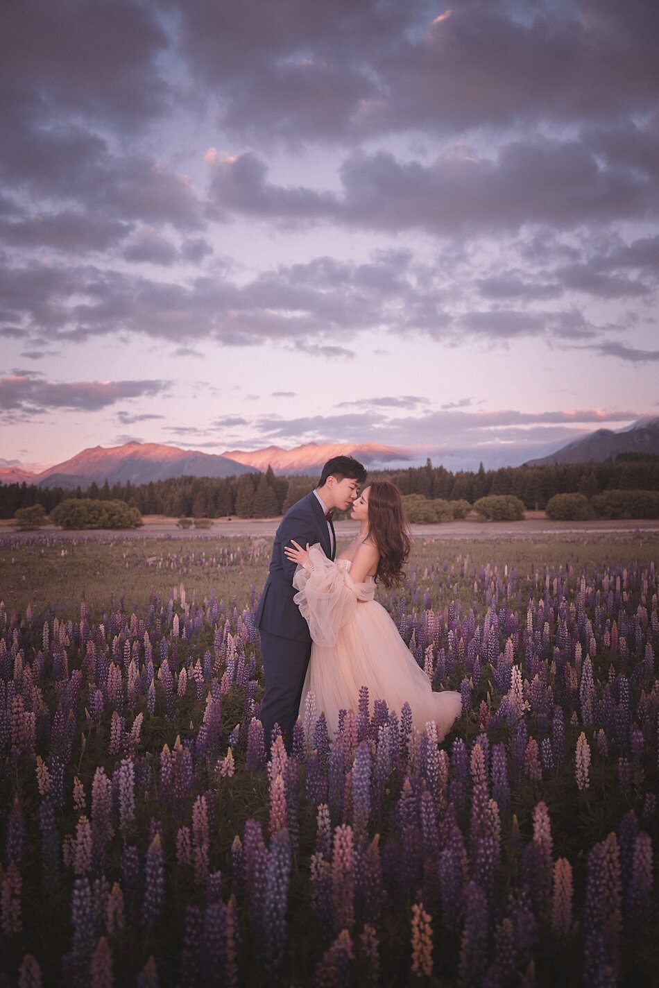 Pre-wedding photoshoot, the lupins, Lake Tekapo. Galia Lahav Haute Couture gown.