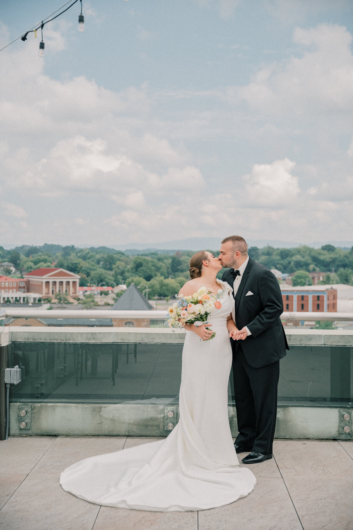 Bride and groom wedding picture on the rooftop of the Bristol Hotel before their Bristol Train Station wedding