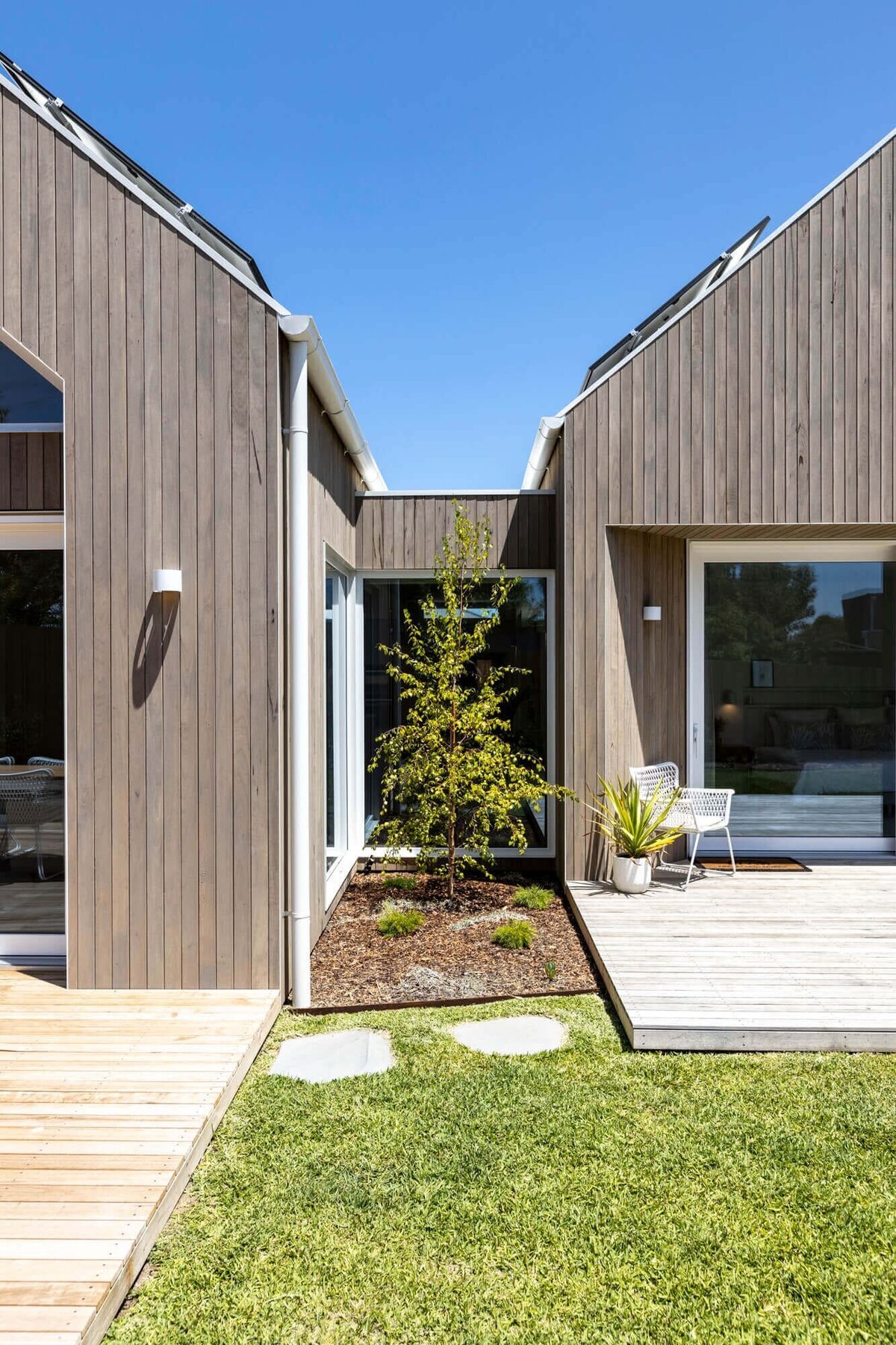 Ocean Grove Builders Phelan St Project that is a timber house with large double glazed windows