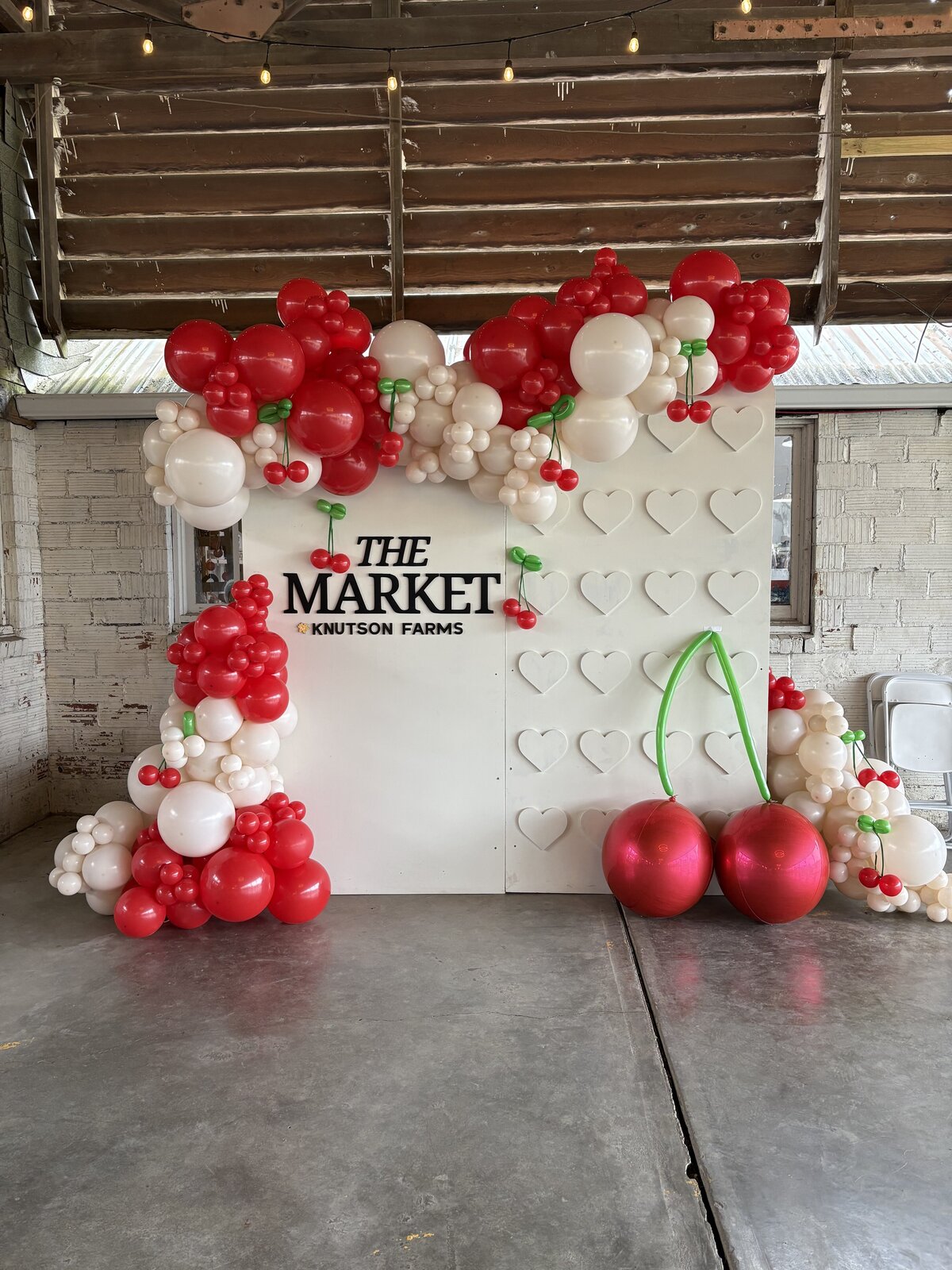 the market balloons cherry themed