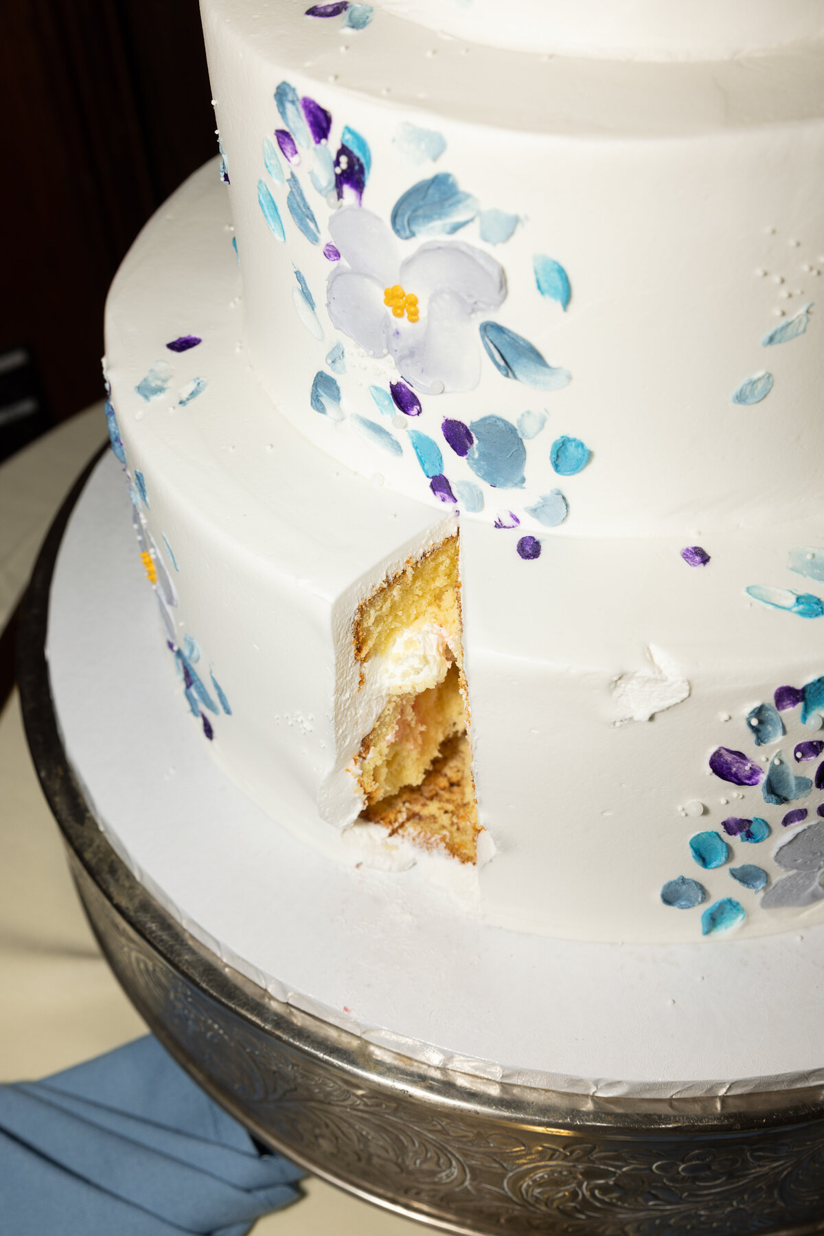 hand-painted-blue-florals-on-wedding-cake-ct-wedding-planner