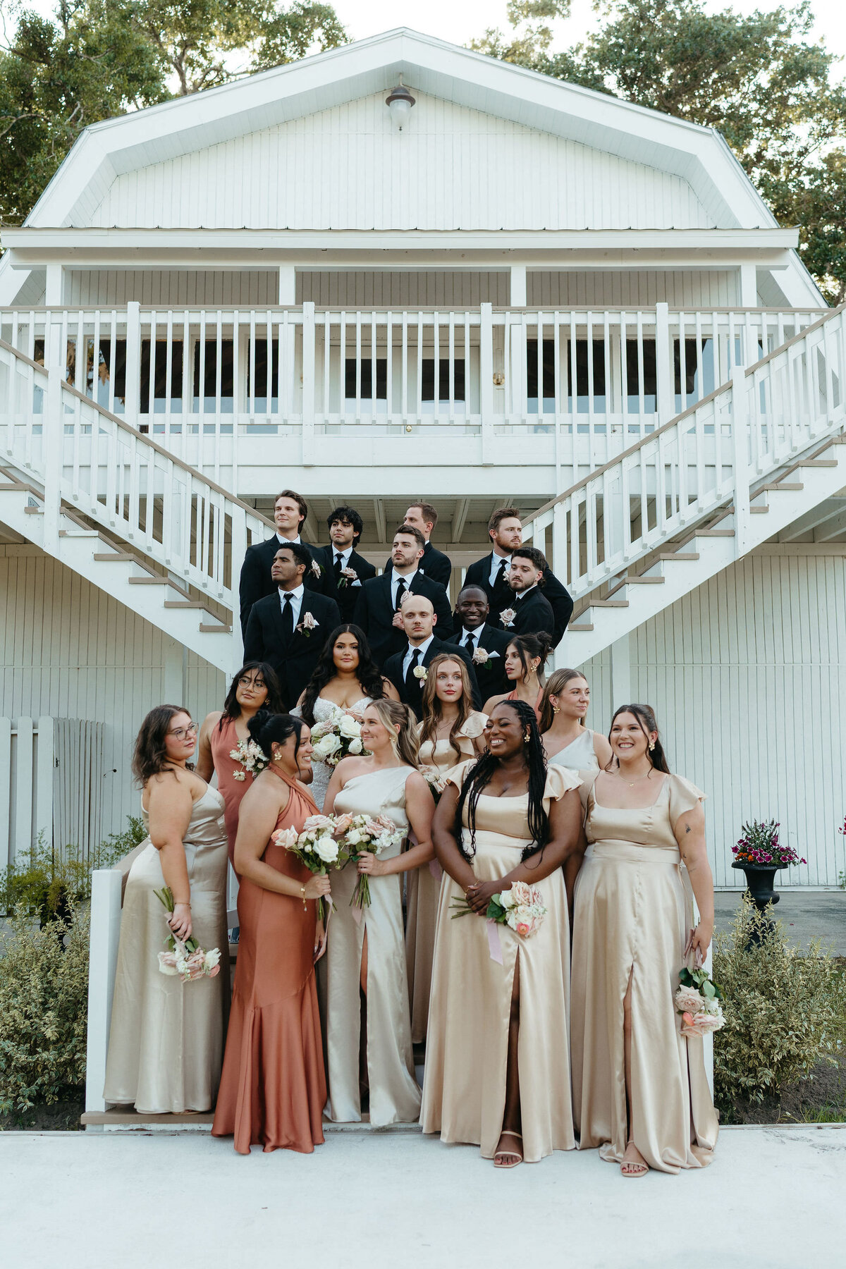 Fun wedding party photo on the white balcony at Uliana Estate in Lakeland, Florida.