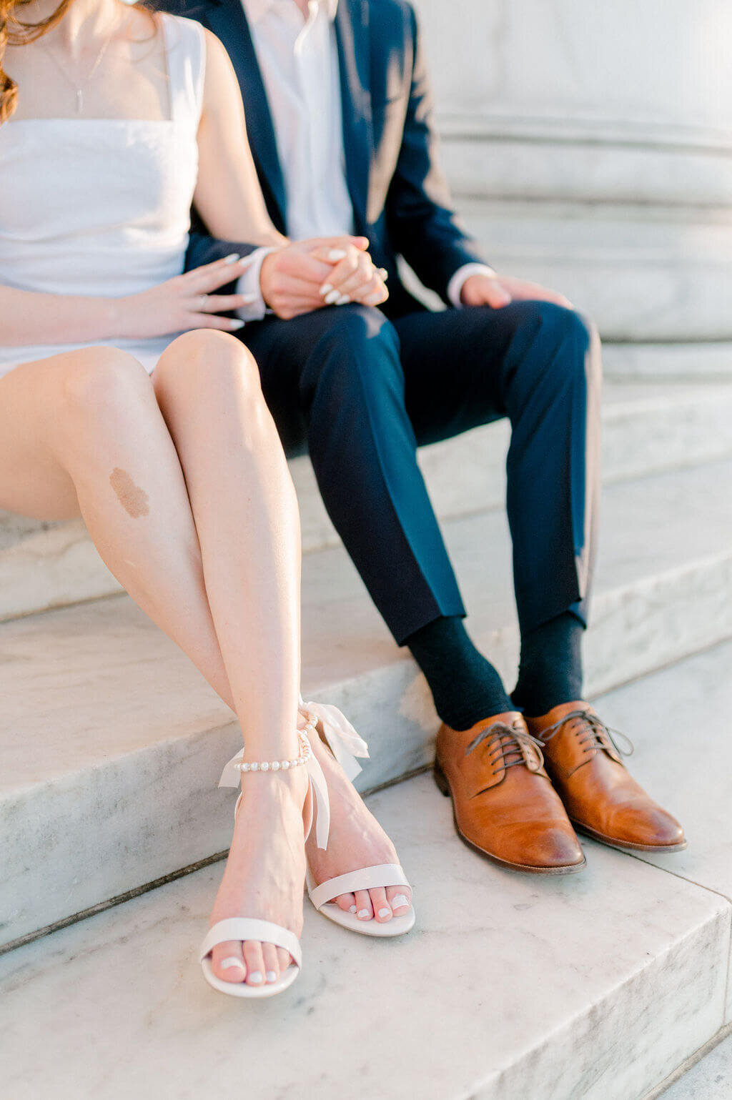 Detail shot of his and her shoes during an enagagement session captured by DC wedding photographer, Rachael Mattio.