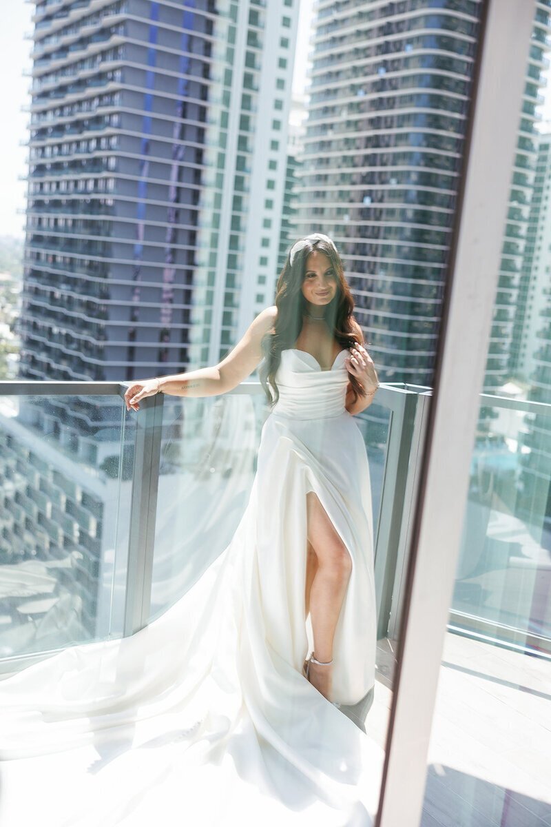 penthouse at riverside wharf photos of bride on balcony in Miami
