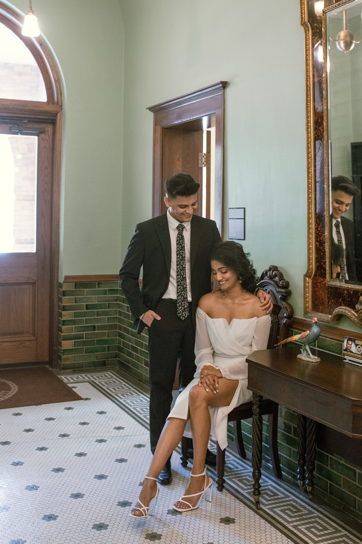 Amidst the hustle and bustle of Houston, I had the honor of photographing an intimate elopement at the courthouse, where the couple's love shone brightly against the backdrop of the city. With the courthouse steps as their stage, they exchanged vows surrounded by the energy of the city, creating a moment of quiet beauty and connection amidst the urban landscape.