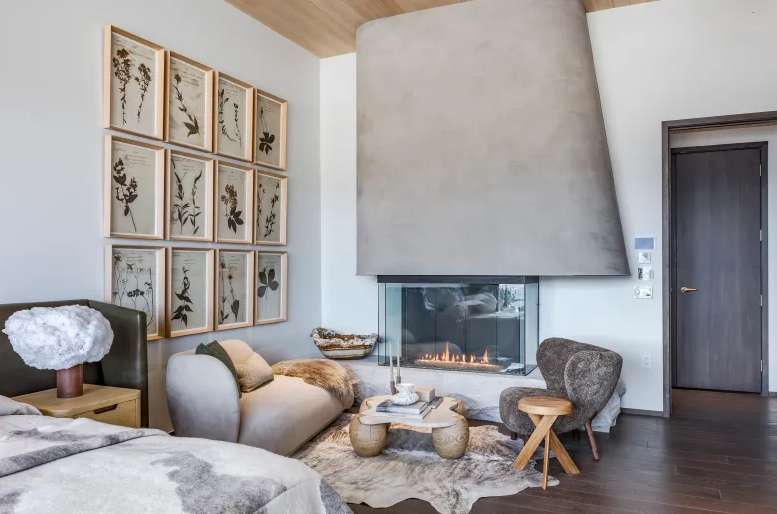 Modern living room with custom fireplace and textured furnishings