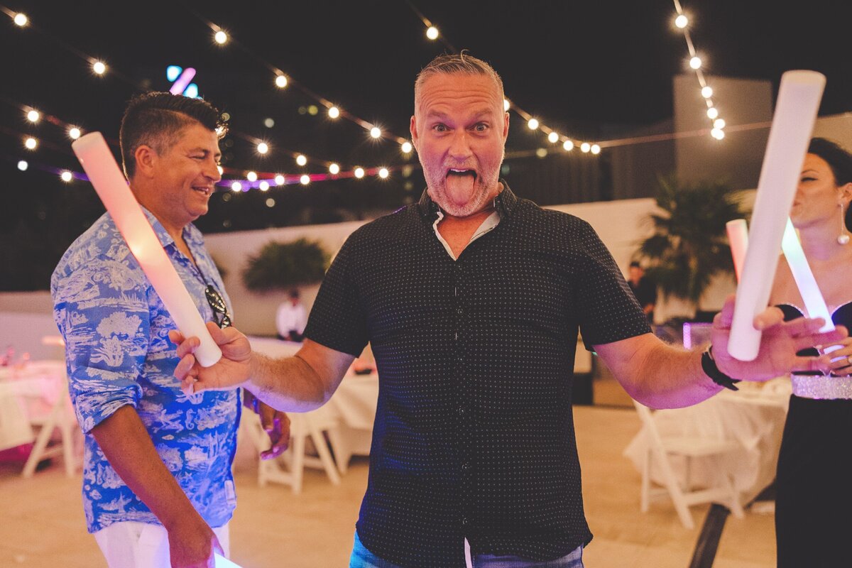 Guest dancing at wedding in Cancun