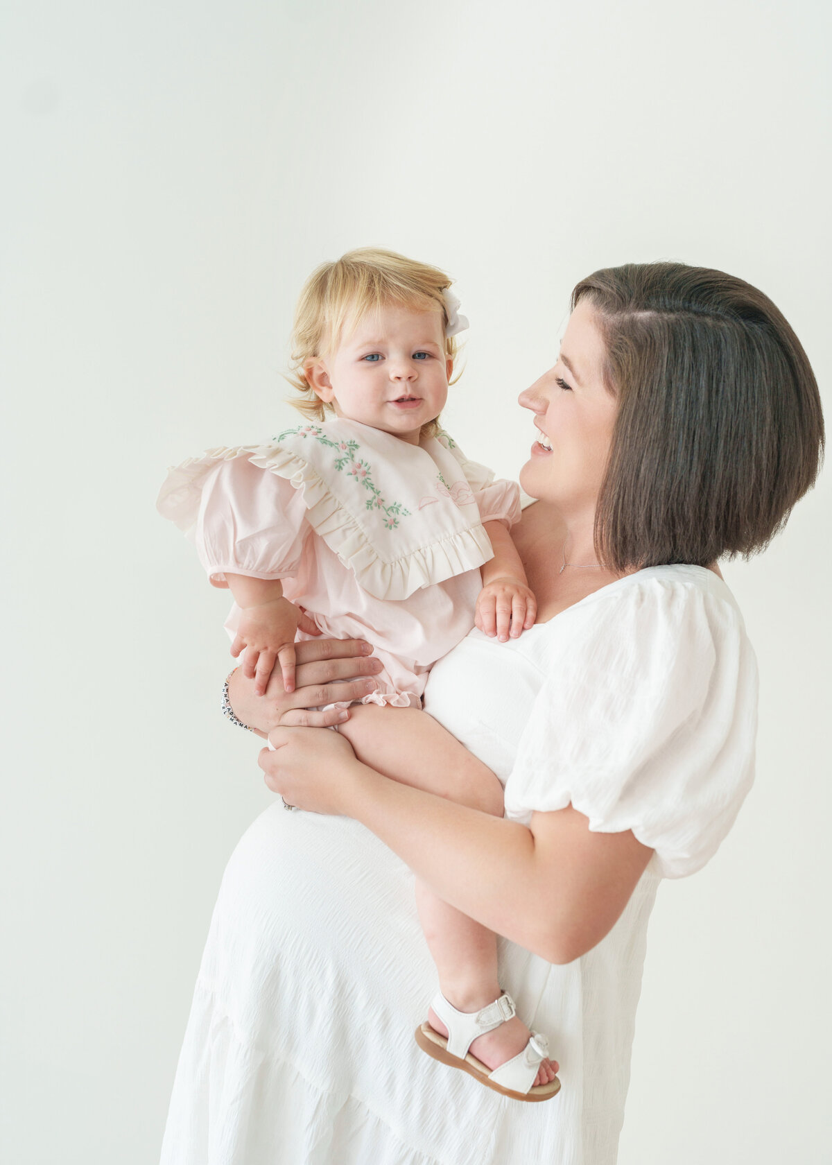 maternity client photographed with her first baby whle expecting the second baby