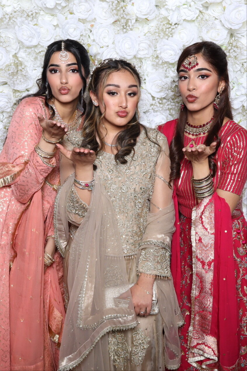 Three Women in Traditional Attire