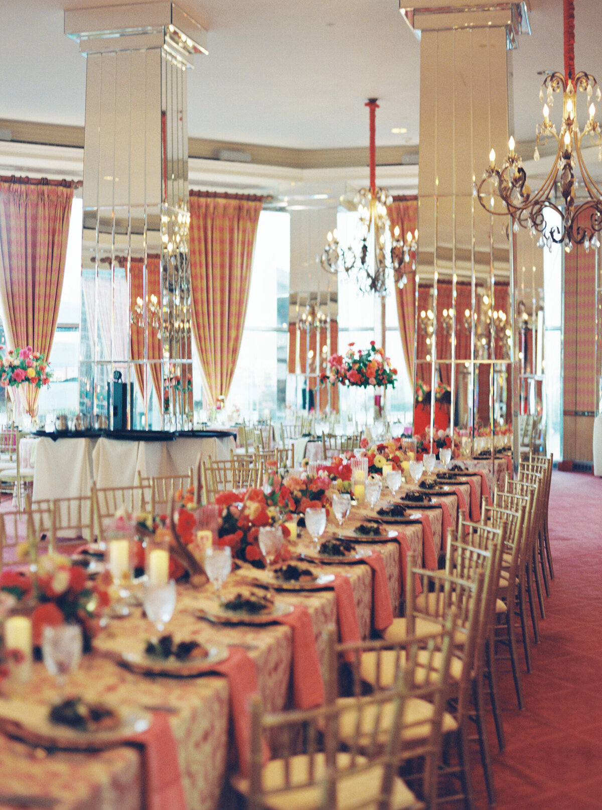 A wedding day photo of the reception hall and tables