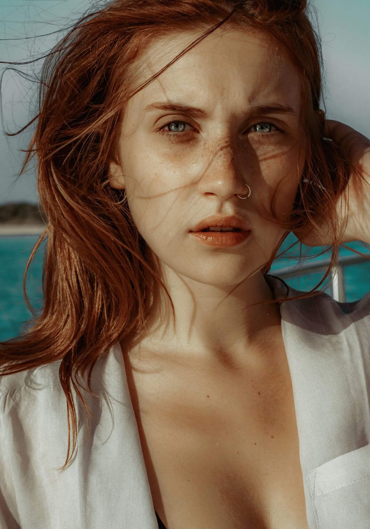 Woman in White Shirt Smiling