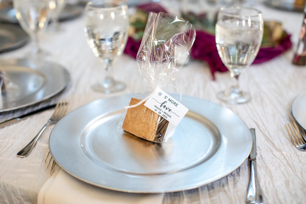 wedding favor for guests on top of silver tray  place setting detail by Firefly Photography