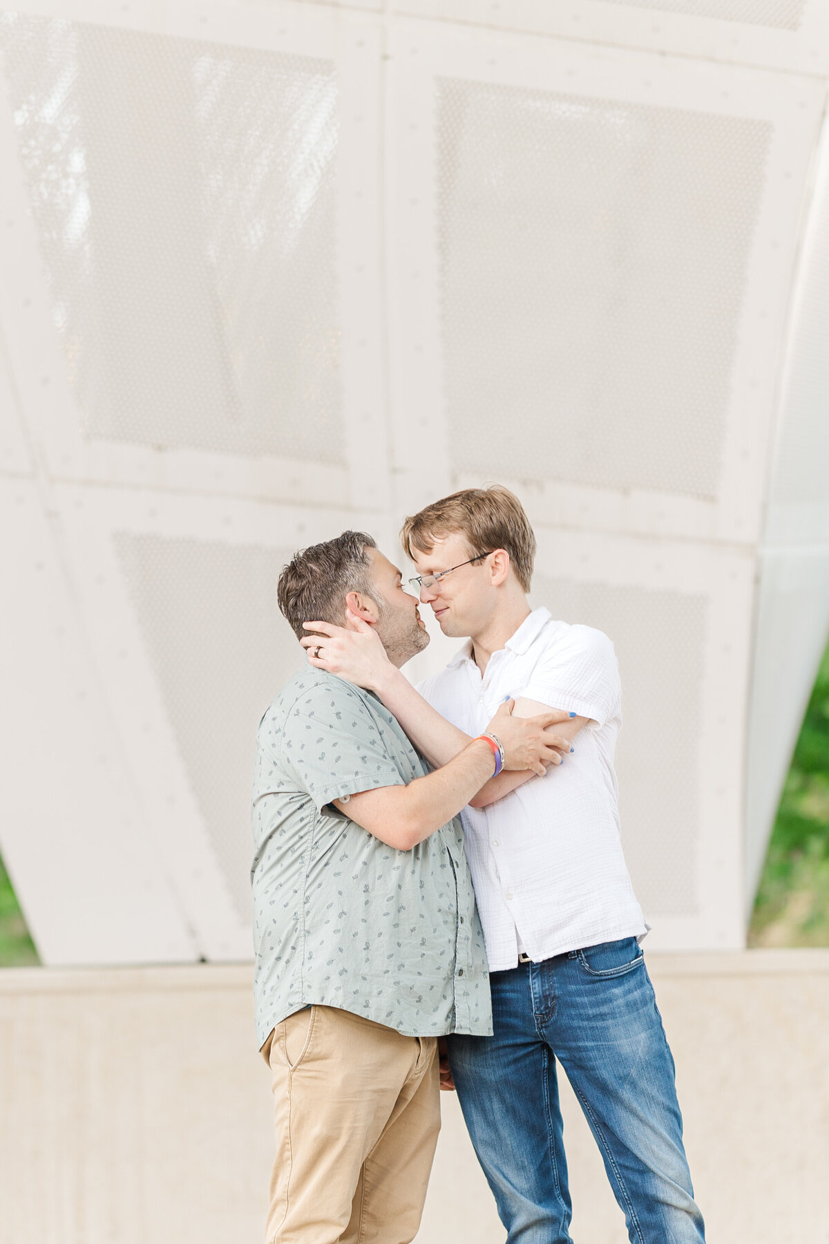 Claire Katan LGBTQ+ engagement photography in downtown Omaha, NE.