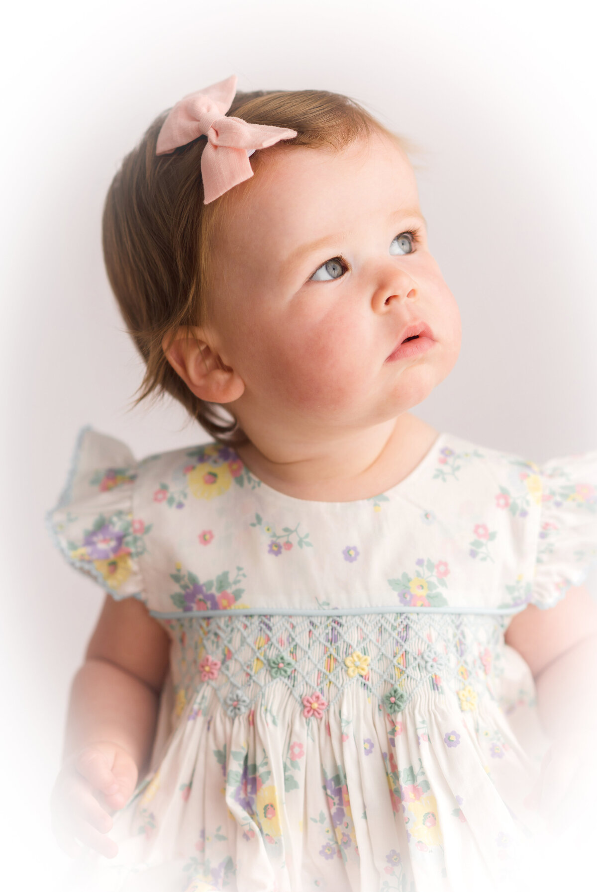 Baby poses for Heirloom Photography Session at Holy City Babies Portrait Studio in Charlston.
