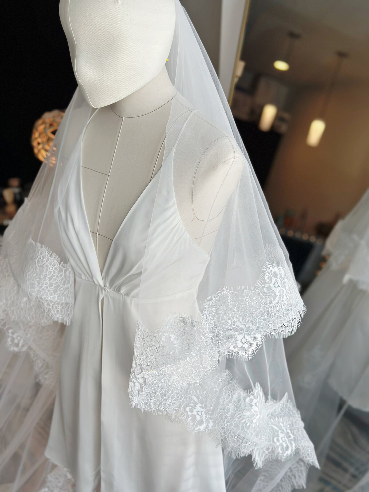 Romantic blusher veil with floral lace trim and airy tulle
