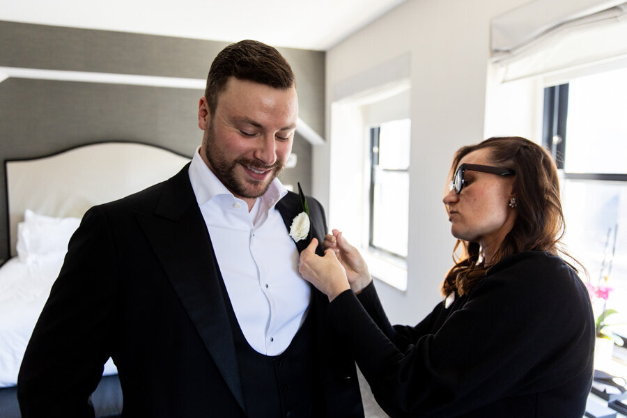 groom-boutonniere-planning-pinning-HBICWeddings-chicago