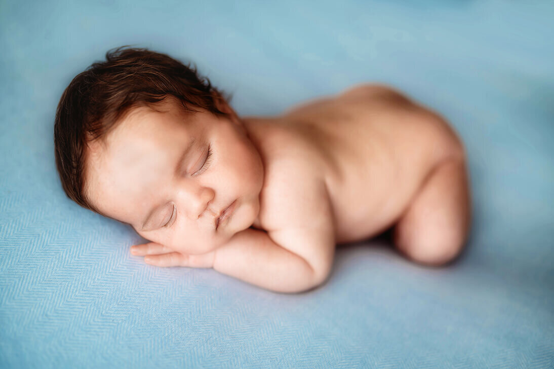 Newborn Baby posed for Newborn Photoshoot in Asheville.