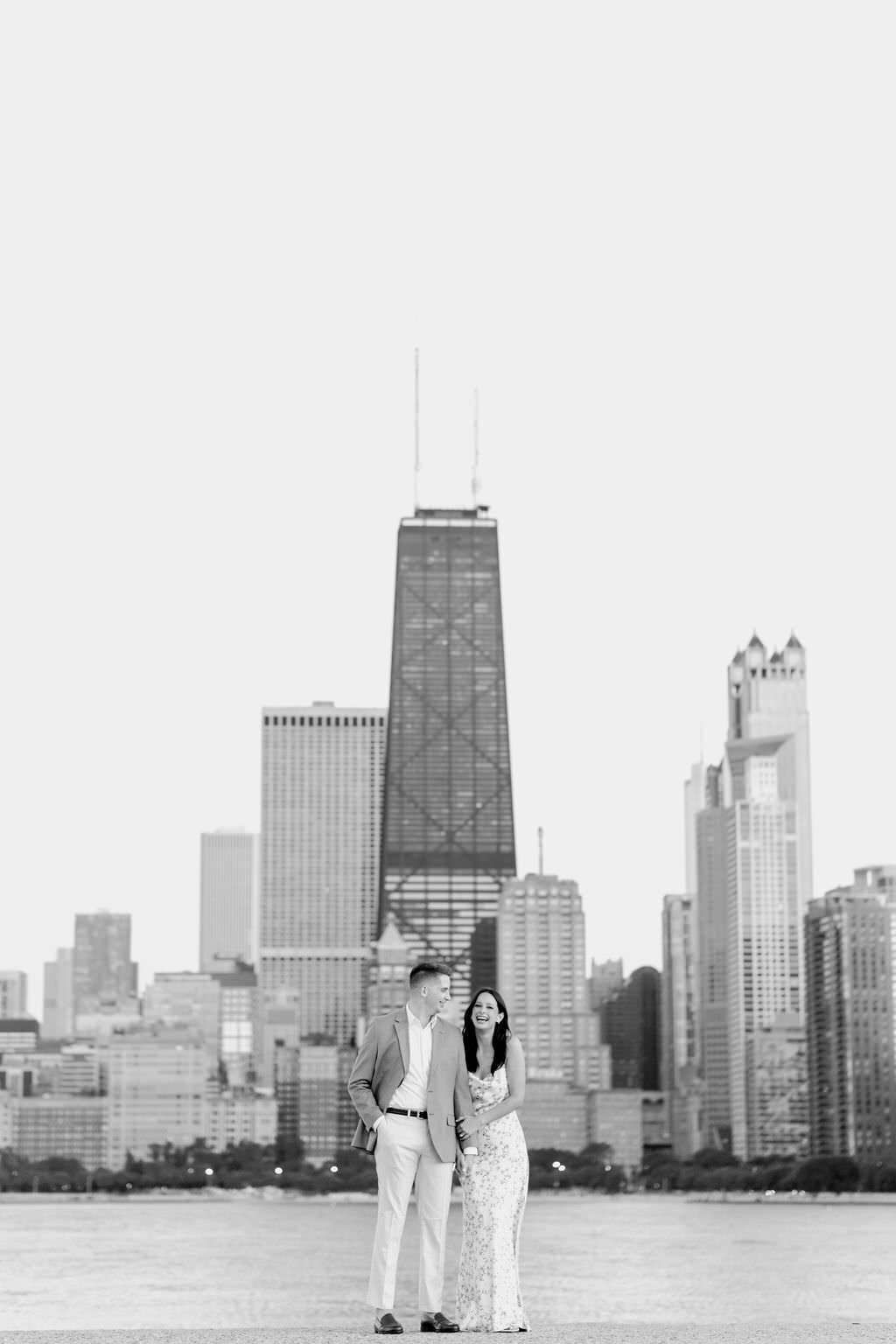 An engagement photography session at The Wrigley Building and North Ave Beach in Chicago, Illinois - 25