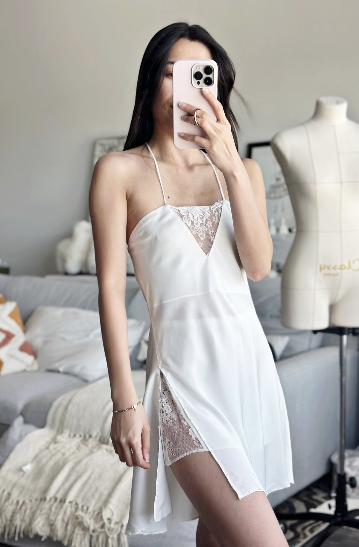 Bride wearing lightweight slip dress ideal for honeymoon evenings
