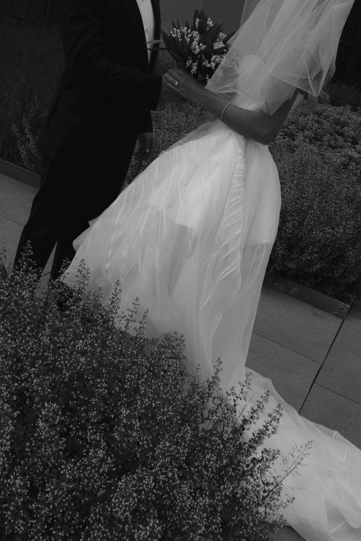 Sophisticated editorial wedding photography showcases ceremony elegance at Old Post Office Chicago, featuring Lauren Alatriste's fashion forward approach combining magazine-worthy imagery with architectural beauty and authentic wedding emotion.