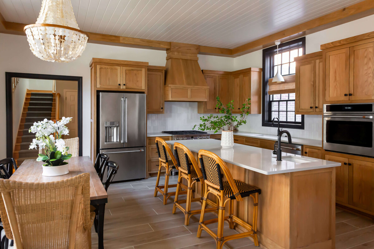 sweet southern home brighton place wooden kitchen with wooden stools and dining table